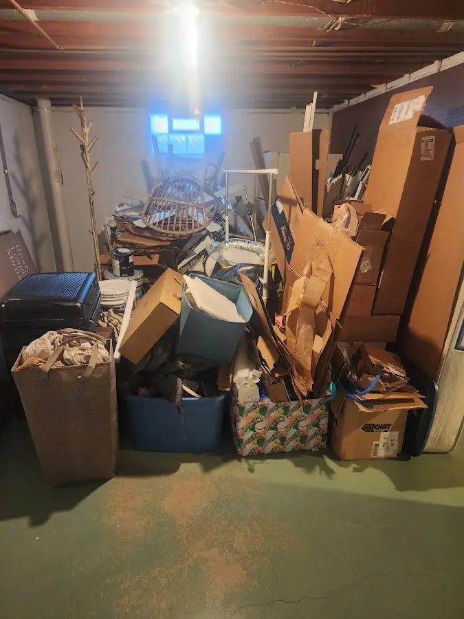 Roll-off dumpster container at job site for 4 Yard Dumpster Rental in Corydon